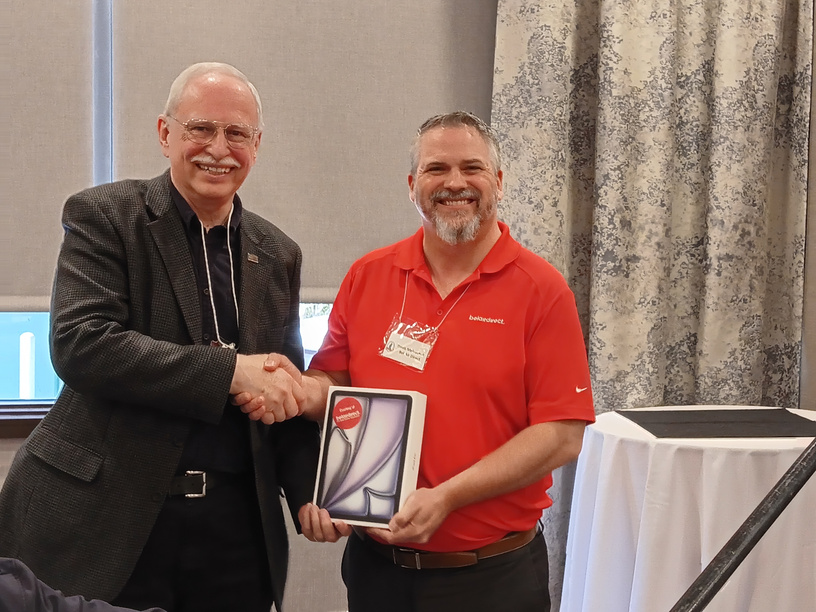 Wilf Brodrick receiving the Belairdirect prize