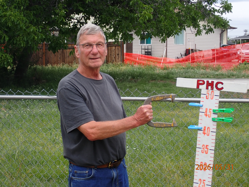Larry Martin demonstrating horseshoes